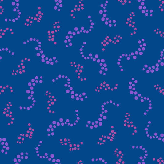 Beach Breezes Berry features a repeating pattern in dusty blue, red, purple, and berry colors of swirling dots reminiscent of sea spray on ocean waves.