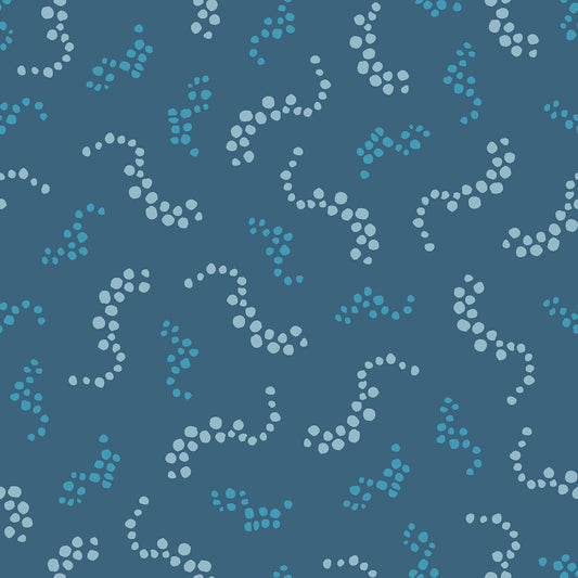 Beach Breezes Dusk features a repeating pattern in french gray and blue colors of swirling dots reminiscent of sea spray on ocean waves.