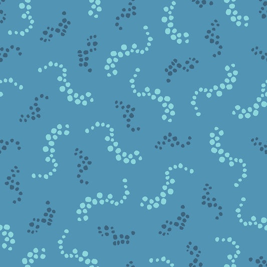 Beach Breezes Frost features a repeating pattern in french blue, dark green, and aqua colors of swirling dots reminiscent of sea spray on ocean waves.