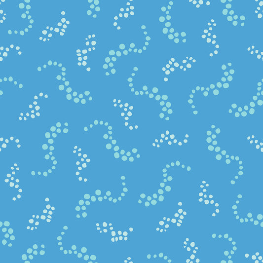 Beach Breezes Ocean features a repeating pattern in blue colors of swirling dots reminiscent of sea spray on ocean waves.