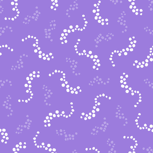 Beach Breezes Purple features a repeating pattern in purple and white colors of swirling dots reminiscent of sea spray on ocean waves.