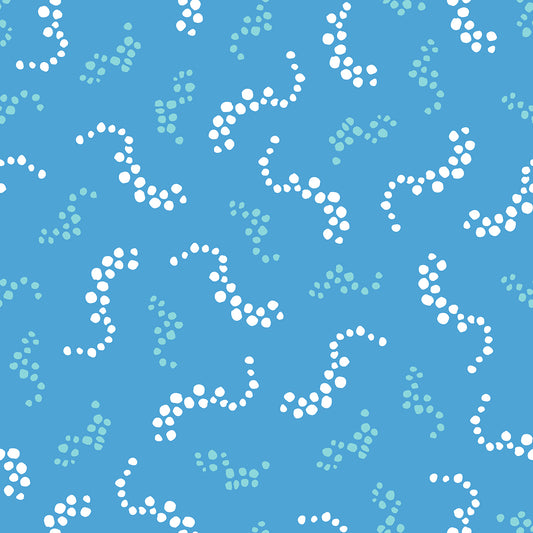 Beach Breezes Rain features a repeating pattern in blue, aqua, and white colors of swirling dots reminiscent of sea spray on ocean waves.